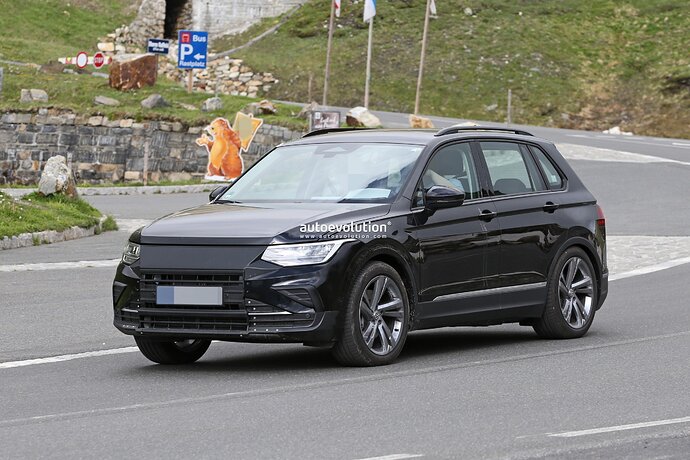 2025-vw-tiguan-spied-with-closed-off-grille-everything-about-it-says-electric-power_11
