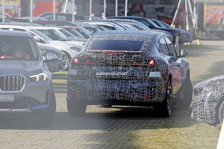 imgi_63_2027-bmw-ix4-gearing-up-for-launch-as-the-new-ix3s-sportier-looking-sibling_21