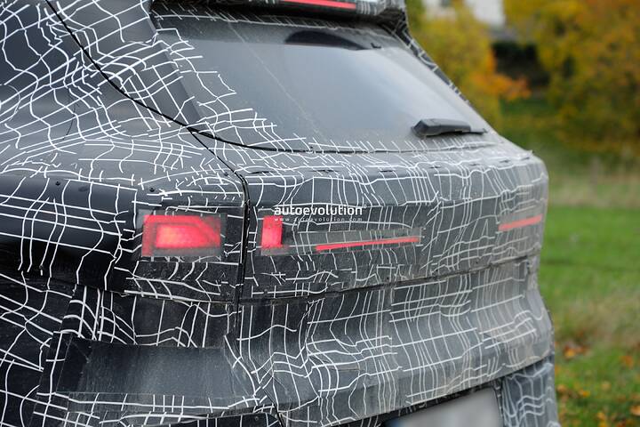 imgi_96_bmws-new-2028-x5-wears-neue-klasse-attire-beneath-trippy-vinyl-stickers_37