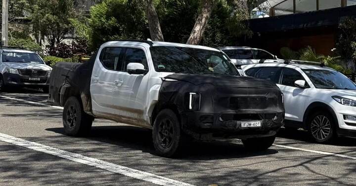 Kia Tasman test car with body color flare-2