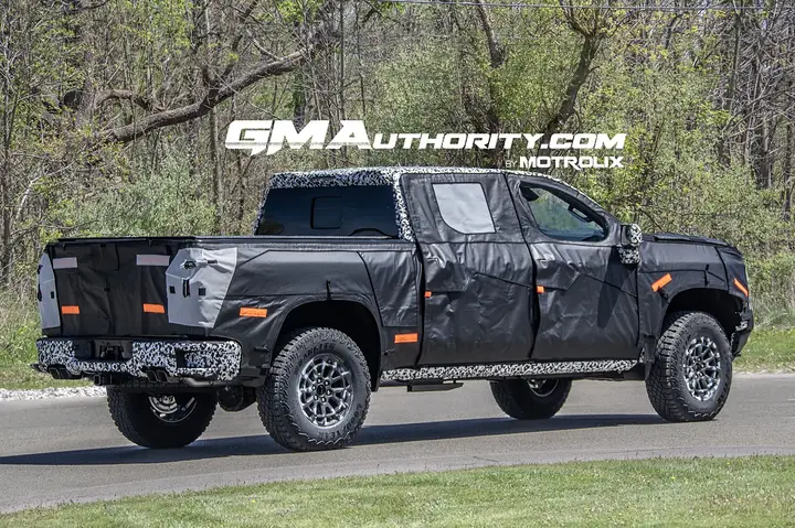 2027-Chevrolet-Silverado-ZR2-1500-Prototype-Spy-Shots-May-2025-Exterior-007-side-rear-three-quarters