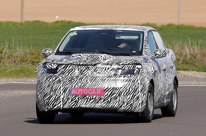 imgi73dacia-city-ev-camo-newcarscoops-0