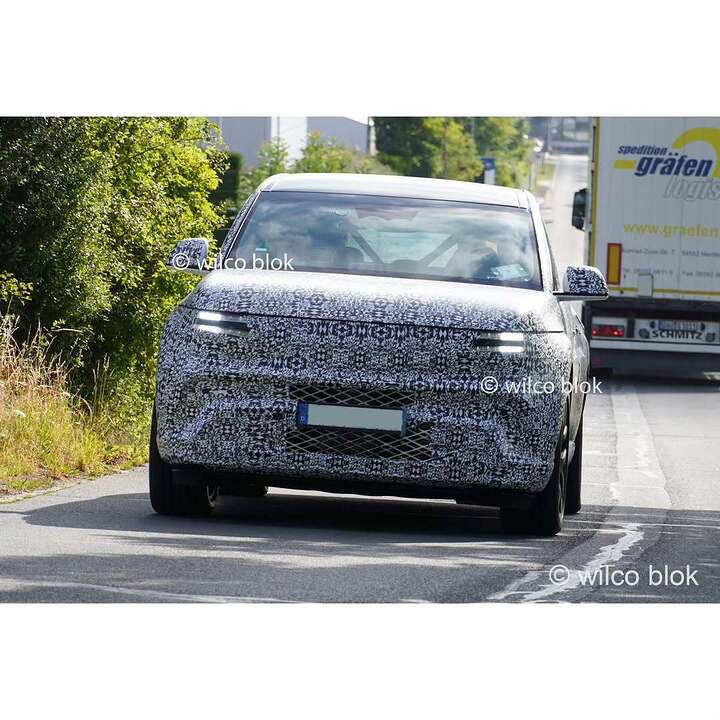 Spotted- camouflaged Genesis GV90 prototype during testing — this flagship EV SUV is taking sha