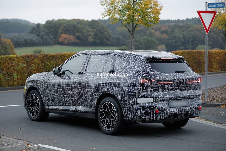 imgi_69_bmws-new-2028-x5-wears-neue-klasse-attire-beneath-trippy-vinyl-stickers_10