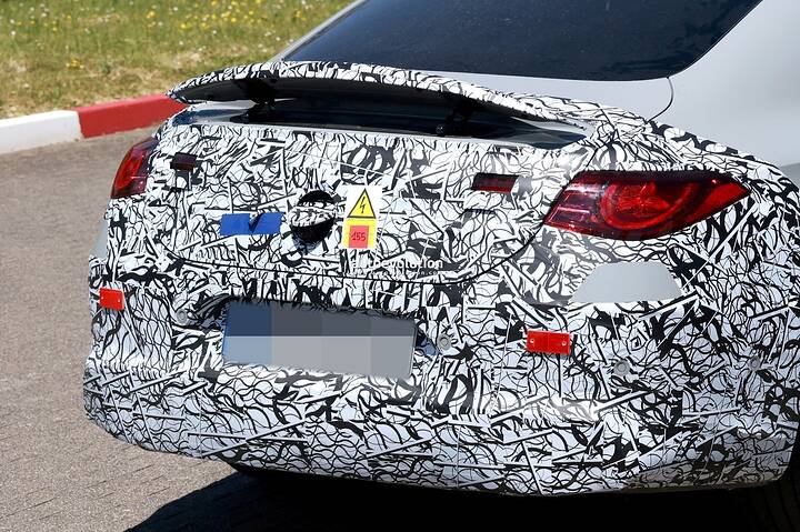 imgi_56_2026-mercedes-amg-cla-eq-performance-ev-spied-flaunting-active-rear-spoiler_16