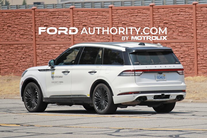 2024-lincoln-aviator-refresh-no-camouflage-white-first-on-the-road-photos-june-2023-exterior-006