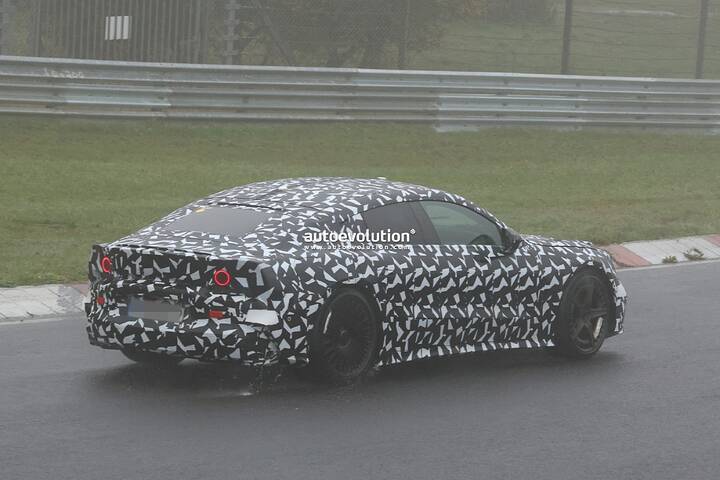 imgi_37_2027-mercedes-amg-gt-4-door-coupe-ev-spied-lapping-the-nurburgring-in-the-wet_8