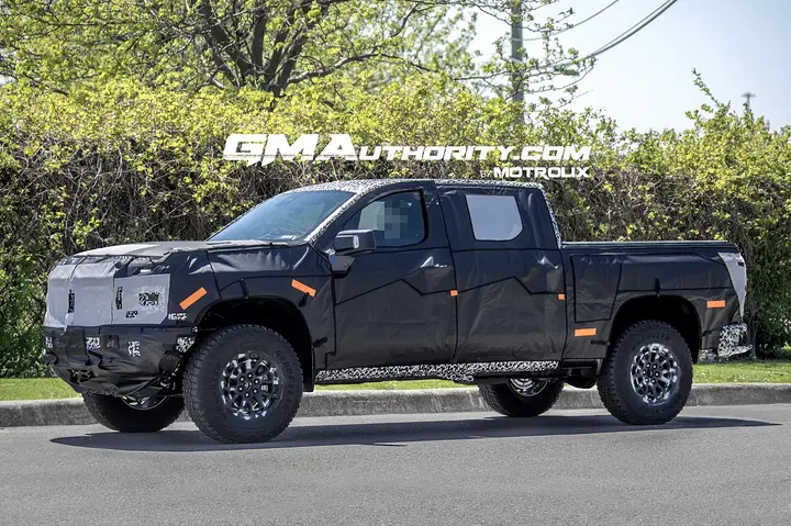 2027-Chevrolet-Silverado-ZR2-1500-Prototype-Spy-Shots-May-2025-Exterior-002-side-front-three-quarters