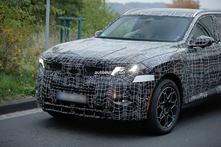 imgi_71_bmws-new-2028-x5-wears-neue-klasse-attire-beneath-trippy-vinyl-stickers_12