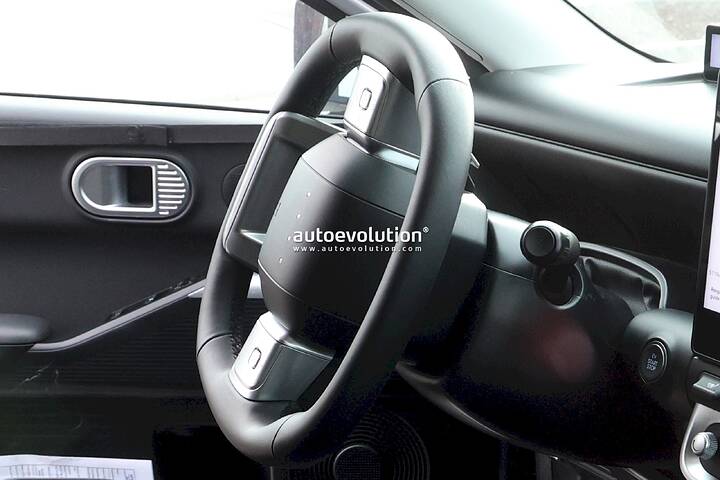 imgi_47_the-hyundai-ioniq-3-spied-with-concept-three-cues-tesla-esque-pleos-infotainment-system_3