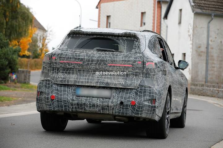 imgi_92_bmws-new-2028-x5-wears-neue-klasse-attire-beneath-trippy-vinyl-stickers_33