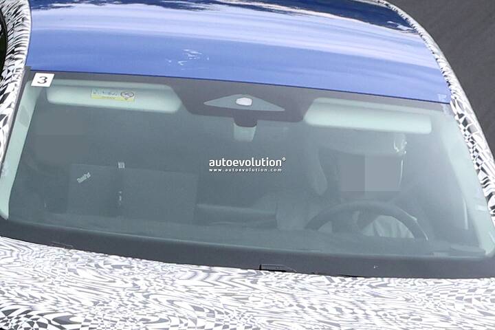 imgi_47_2026-skoda-eviatiq-people-carrier-spied-boasting-vision-7s-concept-styling-influences_11