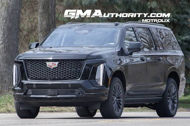 2025-cadillac-escalade-esv-sport-black-raven-gba-prototype-spy-shots-undisguised-april-2024-exterior-003-side-front-three-quarters-grille-headlights