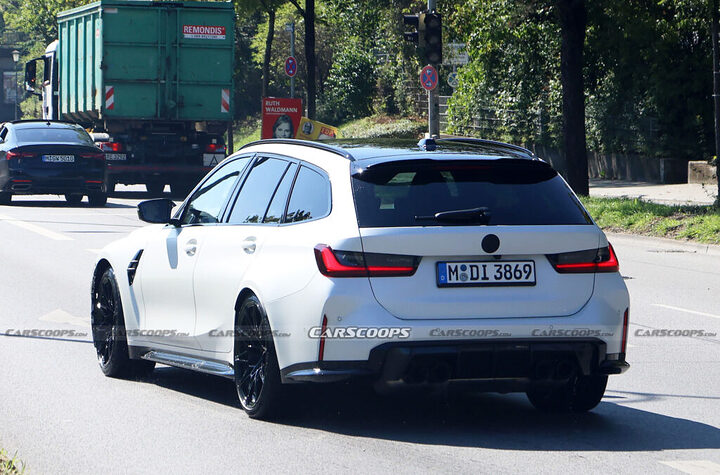 https___www.carscoops.com_wp-content_uploads_2023_10_BMW-M3-Touring-wagon-facelift-00015-1024x676