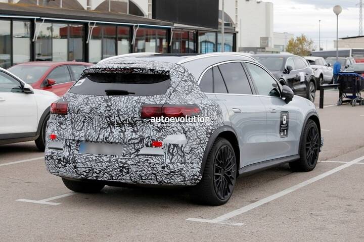 imgi_26_2027-mercedes-amg-glc-eq-spied-with-less-camouflage-thumbnail_2
