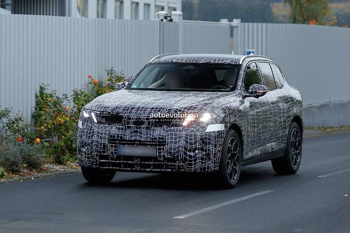 imgi_66_bmws-new-2028-x5-wears-neue-klasse-attire-beneath-trippy-vinyl-stickers_7