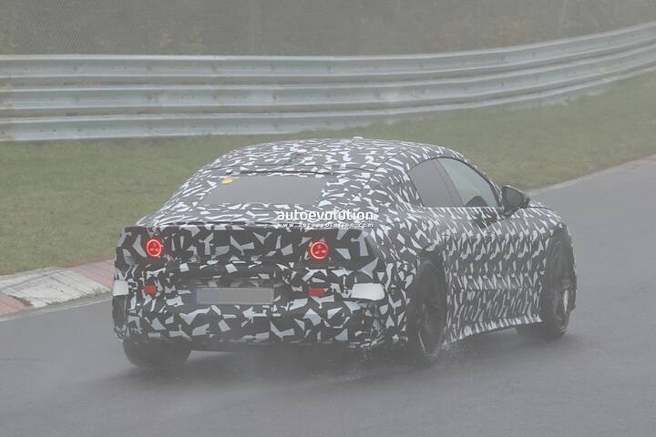 imgi_38_2027-mercedes-amg-gt-4-door-coupe-ev-spied-lapping-the-nurburgring-in-the-wet_9