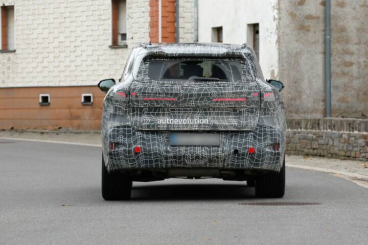 imgi_94_bmws-new-2028-x5-wears-neue-klasse-attire-beneath-trippy-vinyl-stickers_35