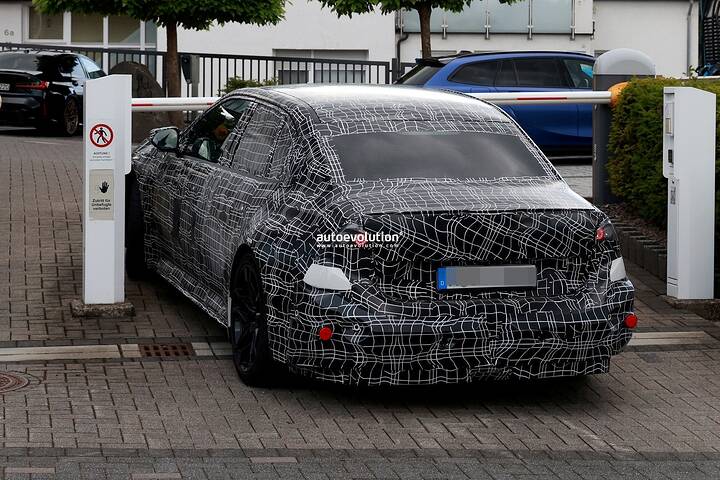 imgi_58_2028-bmw-m3-ev-spied-charging-after-serious-track-action_18