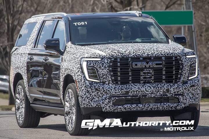 2025-gmc-yukon-xl-denali-ultimate-prototype-spy-shots-little-camo-march-2024-exterior-001-front-front-fascia-drl-daytime-running-lights