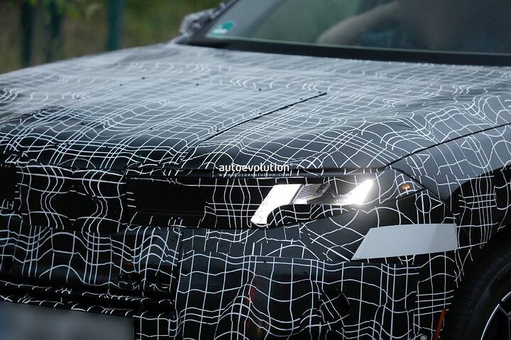 imgi_72_bmws-new-2028-x5-wears-neue-klasse-attire-beneath-trippy-vinyl-stickers_13