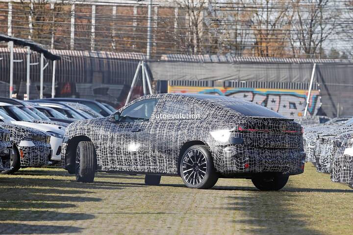 imgi_42_2027-bmw-ix4-gearing-up-for-launch-as-the-new-ix3s-sportier-looking-sibling-260908_1