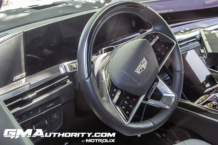 2025-cadillac-escalade-v-prototype-spy-shots-no-camo-may-2024-interior-004-cockpit-dash-steering-wheel-digital-instrument-panel-gauge-cluster-screen