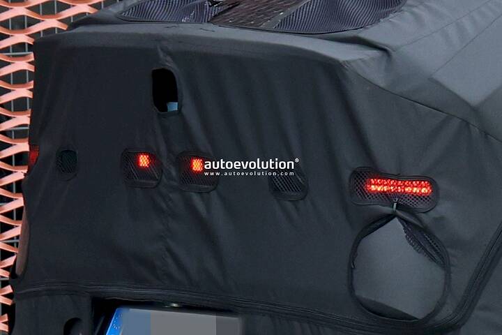 imgi_74_the-hyundai-ioniq-3-spied-with-concept-three-cues-tesla-esque-pleos-infotainment-system_24