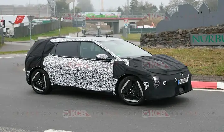 kia-ev4-hatchback-spied-loses-camouflage-6-980x577.jpg