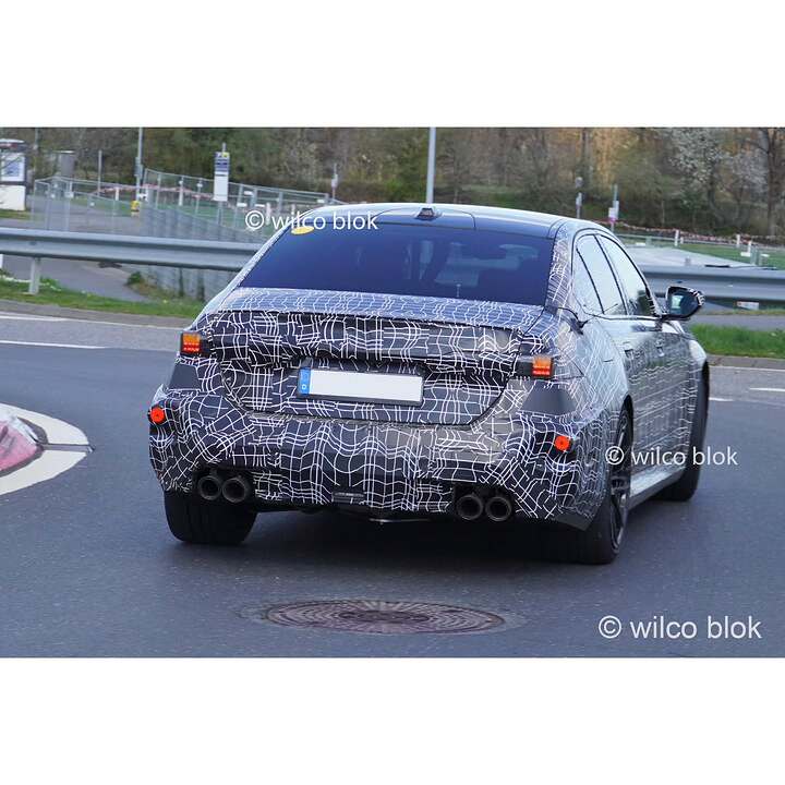 BMW M5 facelift spotted-newcarscoops-3947ba