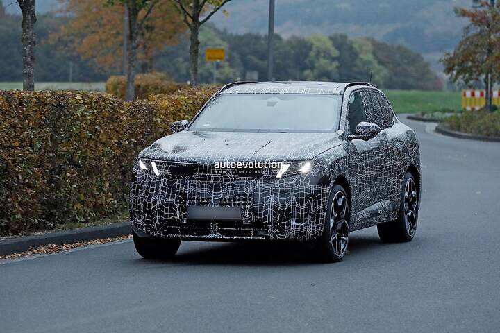 imgi_75_bmws-new-2028-x5-wears-neue-klasse-attire-beneath-trippy-vinyl-stickers_16