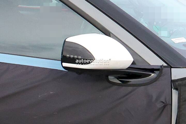 imgi_59_the-hyundai-ioniq-3-spied-with-concept-three-cues-tesla-esque-pleos-infotainment-system_9