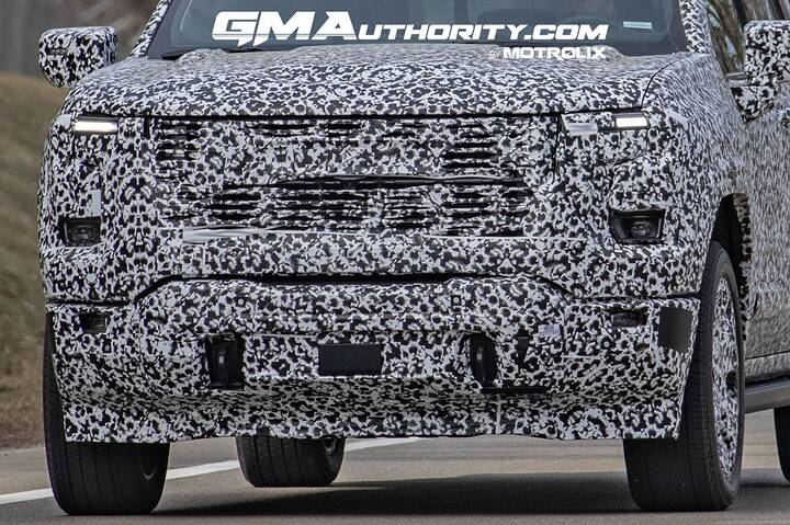 imgi_104_2027-GMC-Sierra-Denali-1500-Prototype-Spy-Shots-Less-Camo-March-2026-Exterior-003-front-fascia-DRL-daytime-running-lights