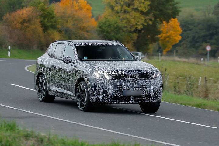 imgi_61_bmws-new-2028-x5-wears-neue-klasse-attire-beneath-trippy-vinyl-stickers_2