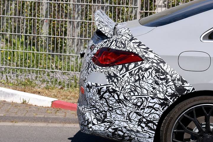 imgi_44_2026-mercedes-amg-cla-eq-performance-ev-spied-flaunting-active-rear-spoiler_4