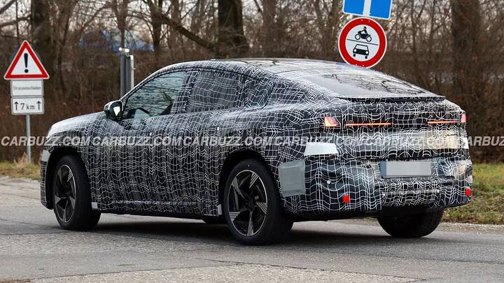 imgi_83_2027-bmw-ix4-exterior-rear-quarter-3