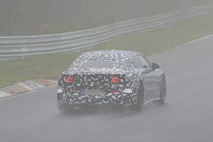 imgi_39_2027-mercedes-amg-gt-4-door-coupe-ev-spied-lapping-the-nurburgring-in-the-wet_10