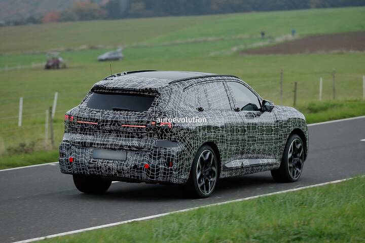 imgi_65_bmws-new-2028-x5-wears-neue-klasse-attire-beneath-trippy-vinyl-stickers_6