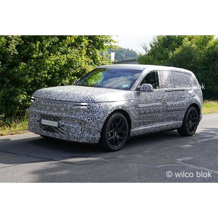 Spotted- camouflaged Genesis GV90 prototype during testing — this flagship EV SUV is taking sha (1)