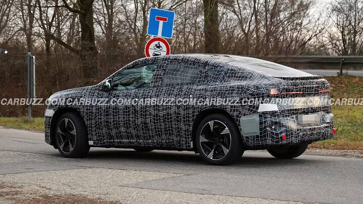 imgi_82_2027-bmw-ix4-exterior-rear-quarter-2