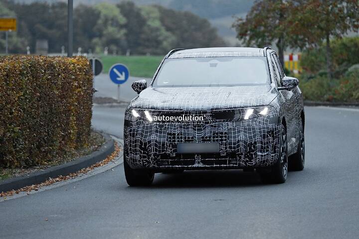 imgi_74_bmws-new-2028-x5-wears-neue-klasse-attire-beneath-trippy-vinyl-stickers_15