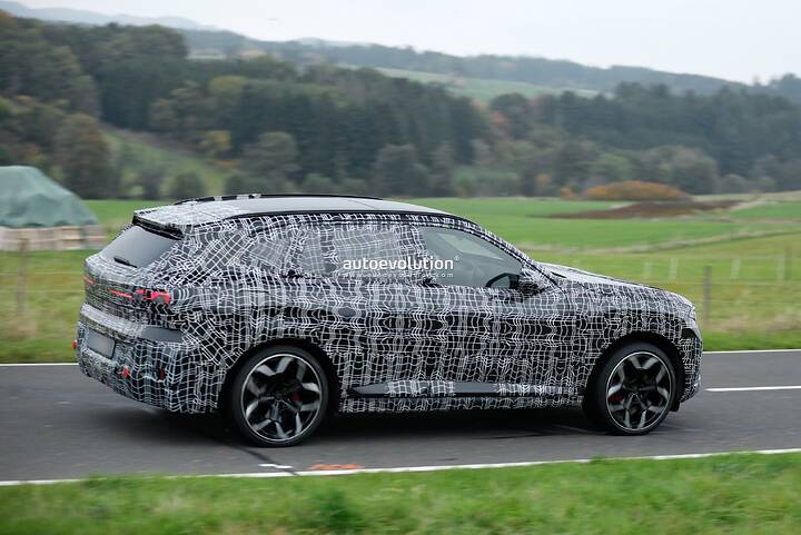 imgi_64_bmws-new-2028-x5-wears-neue-klasse-attire-beneath-trippy-vinyl-stickers_5