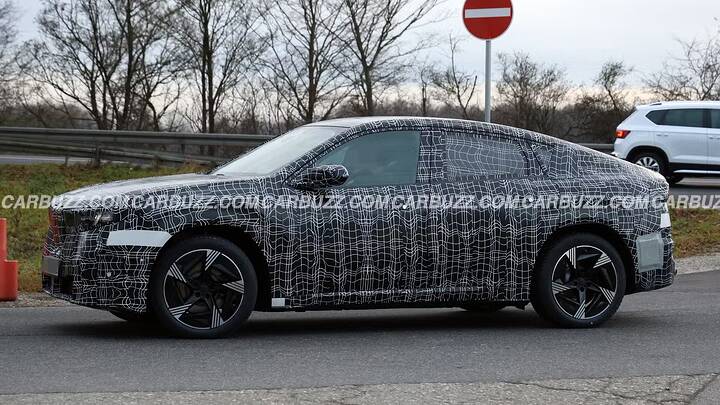 imgi_76_2027-bmw-ix4-exterior-front-quarter-view-11