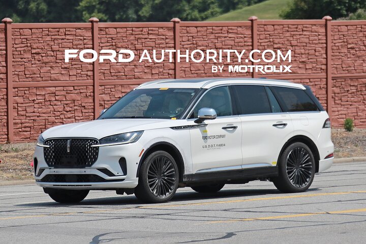 2024-lincoln-aviator-refresh-no-camouflage-white-first-on-the-road-photos-june-2023-exterior-001